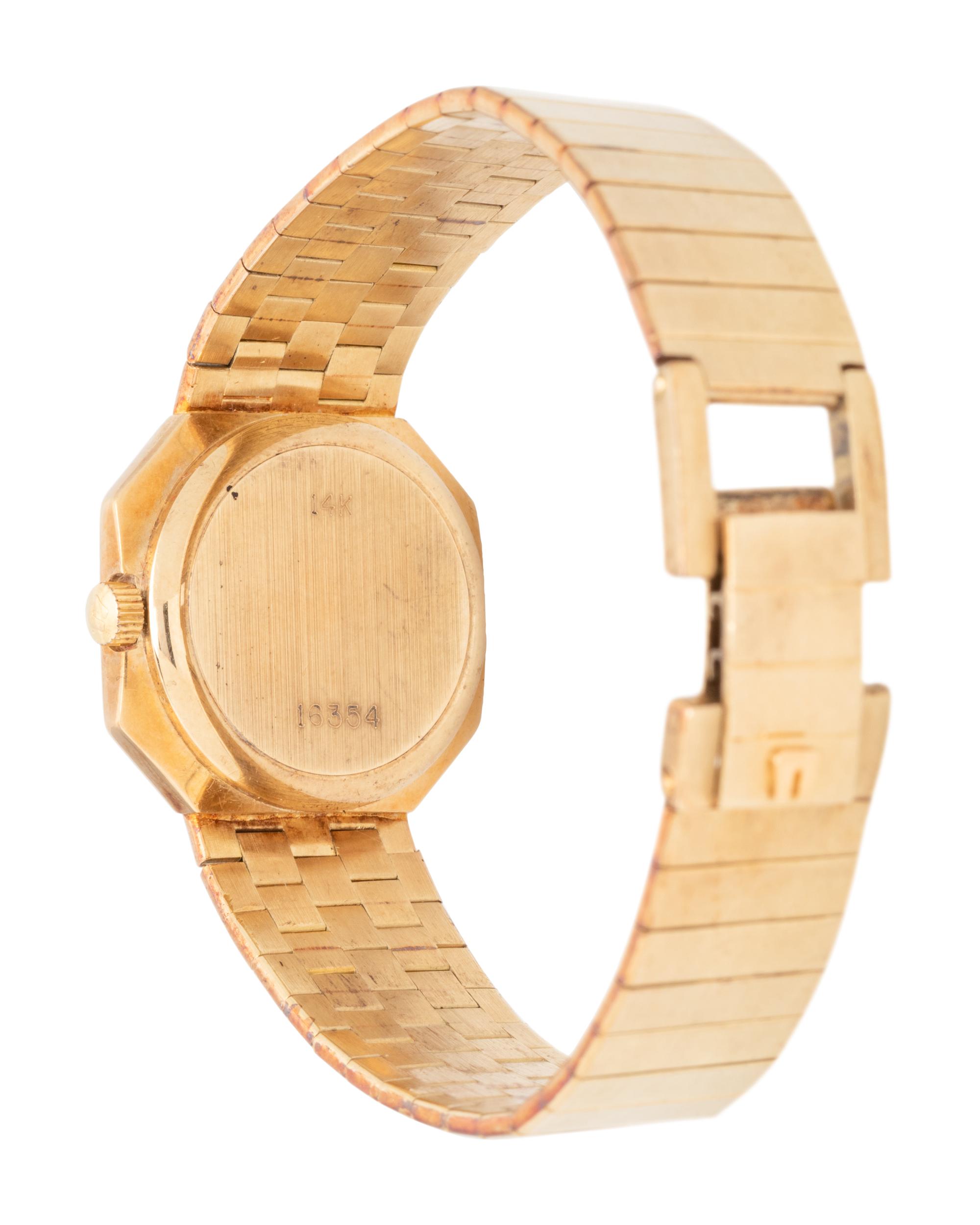UNIVERSAL GENEVE, 14K YELLOW GOLD WRISTWATCH