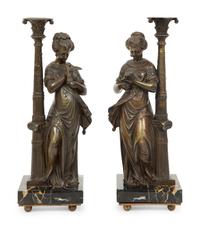 A Pair of French Bronze and Marble Figural Candlesticks
