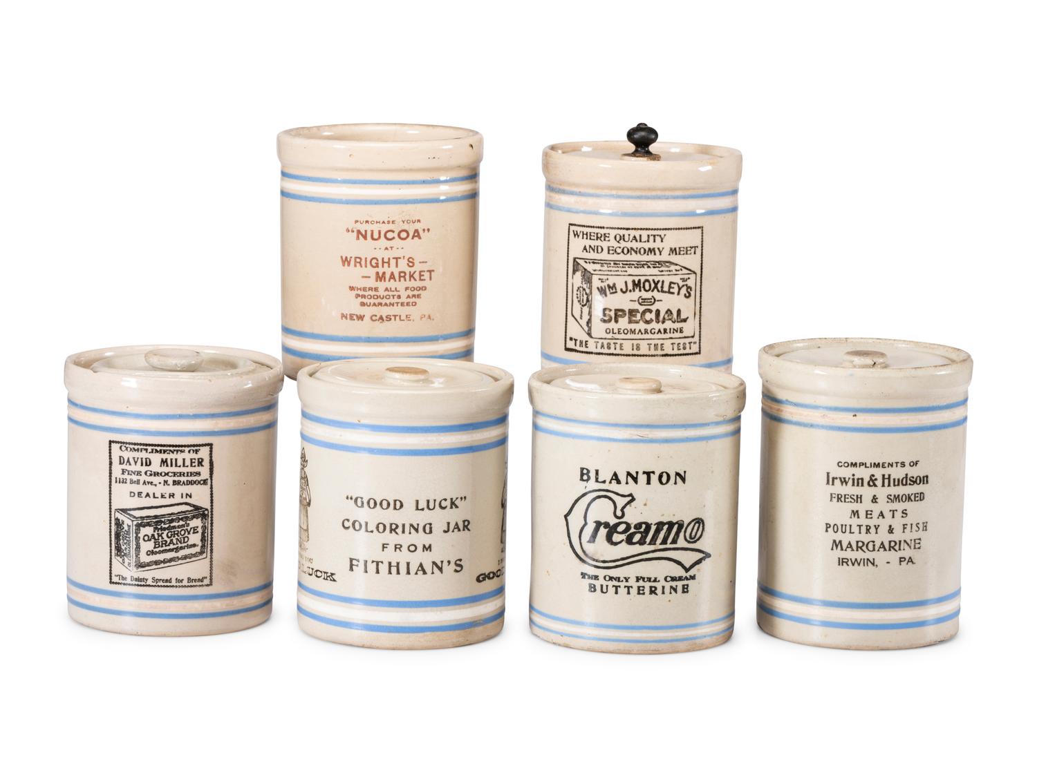Six Stoneware Advertising Crocks