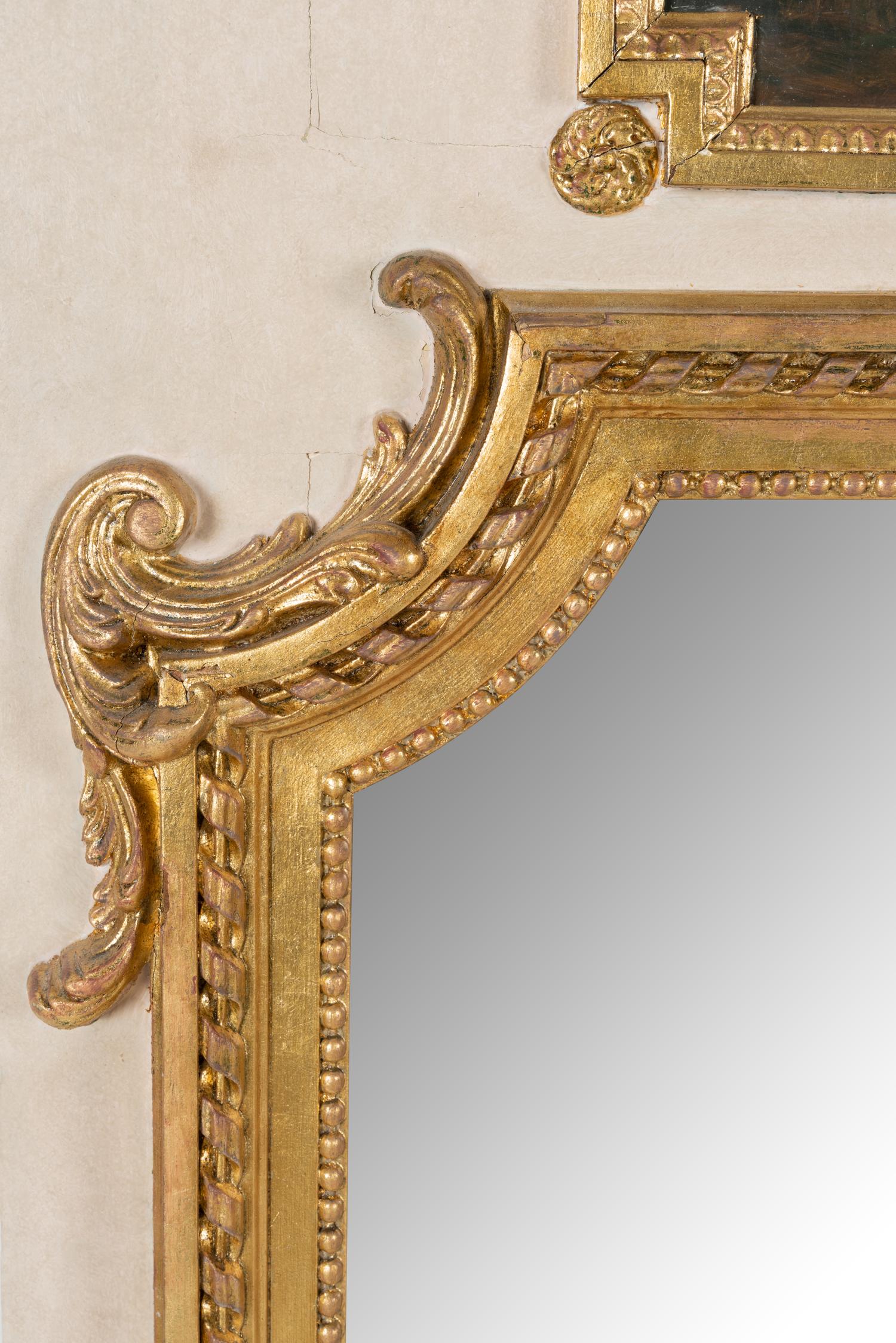 A French Painted and Parcel Gilt Trumeau Mirror