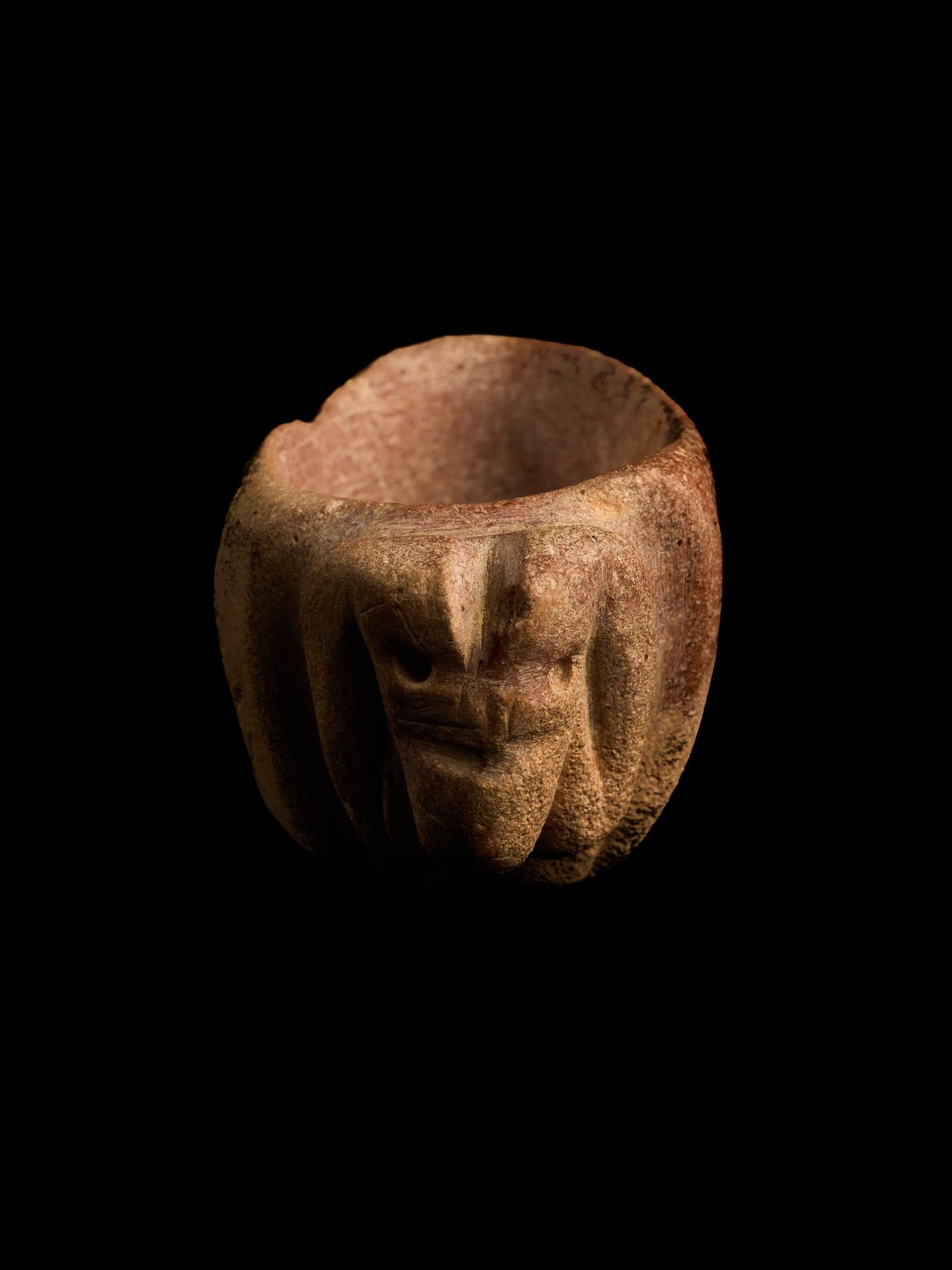 A Mesopotamian Red Marble Bowl in the Form of a Ram