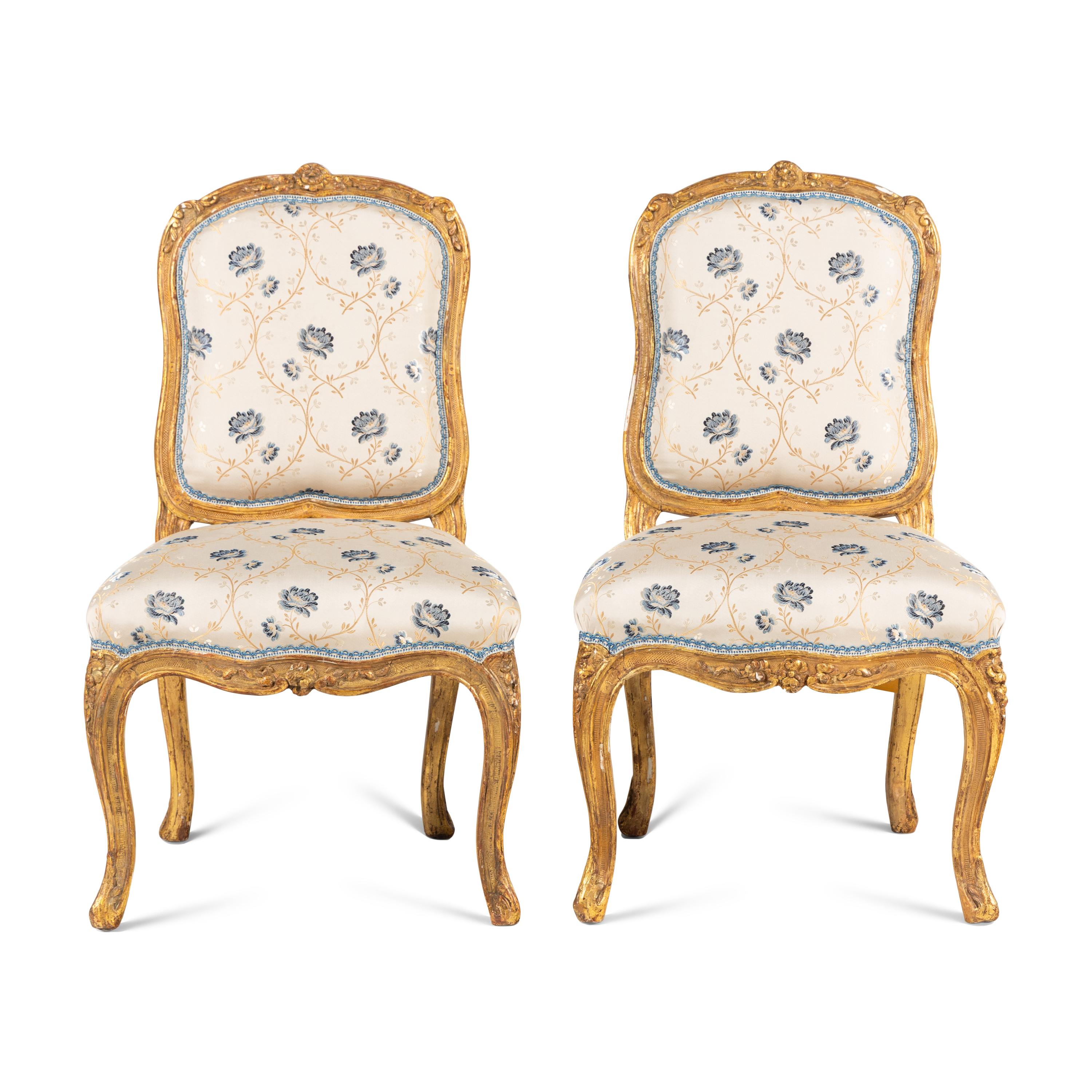 A Pair of Louis XV Carved Giltwood Chaises à la Reine