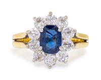 A Bicolor Gold, Sapphire and Diamond Ring,