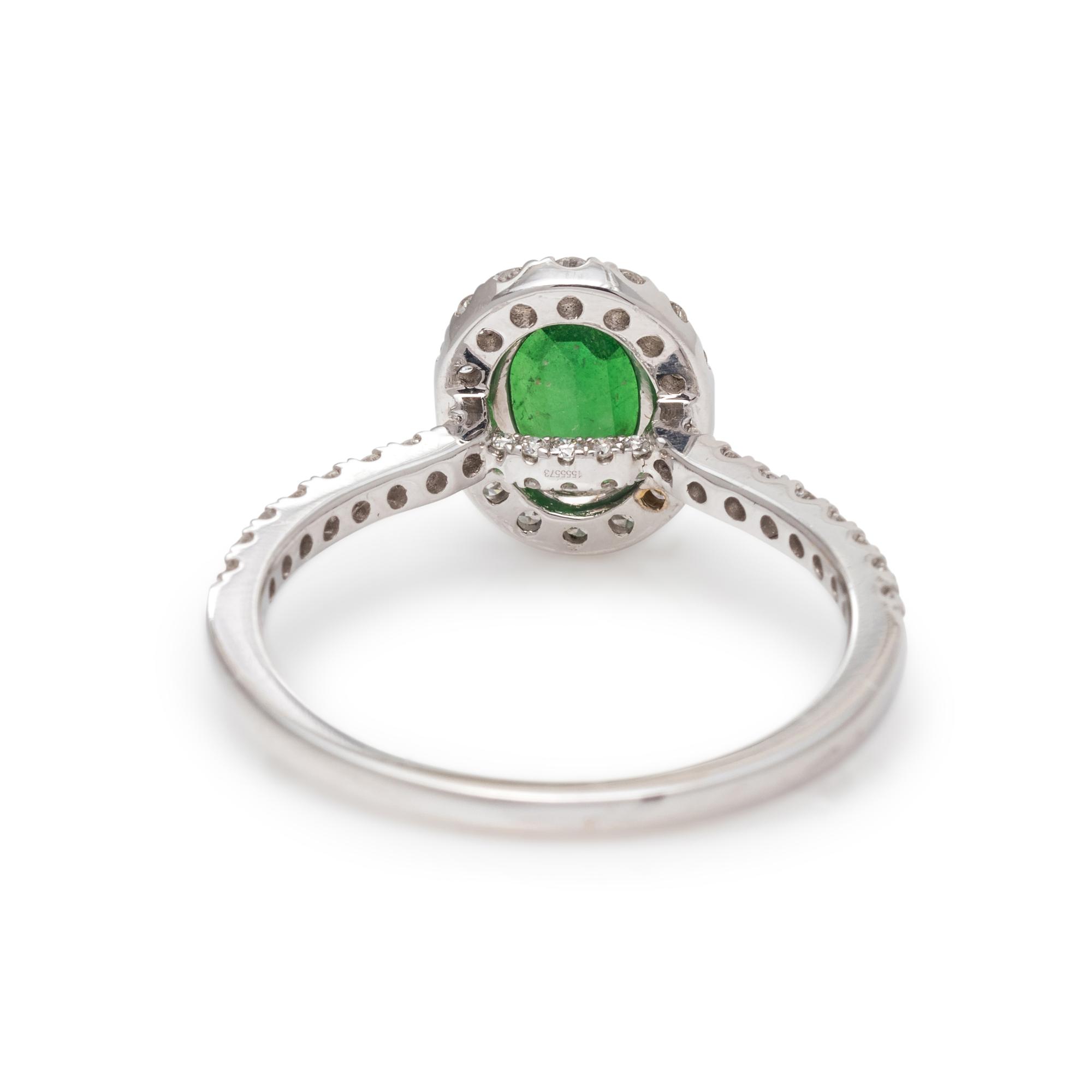 TSAVORITE GARNET AND DIAMOND RING