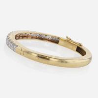 An 18K Gold and Diamond Bangle Bracelet by Carl D. Lindstrom & Sons