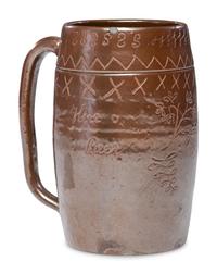 A Heavily Incised Albany Slip-Glazed Stoneware Beer Mug