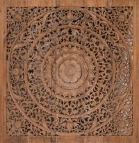 A Southeast Asian Carved Teakwood Mandala Panel