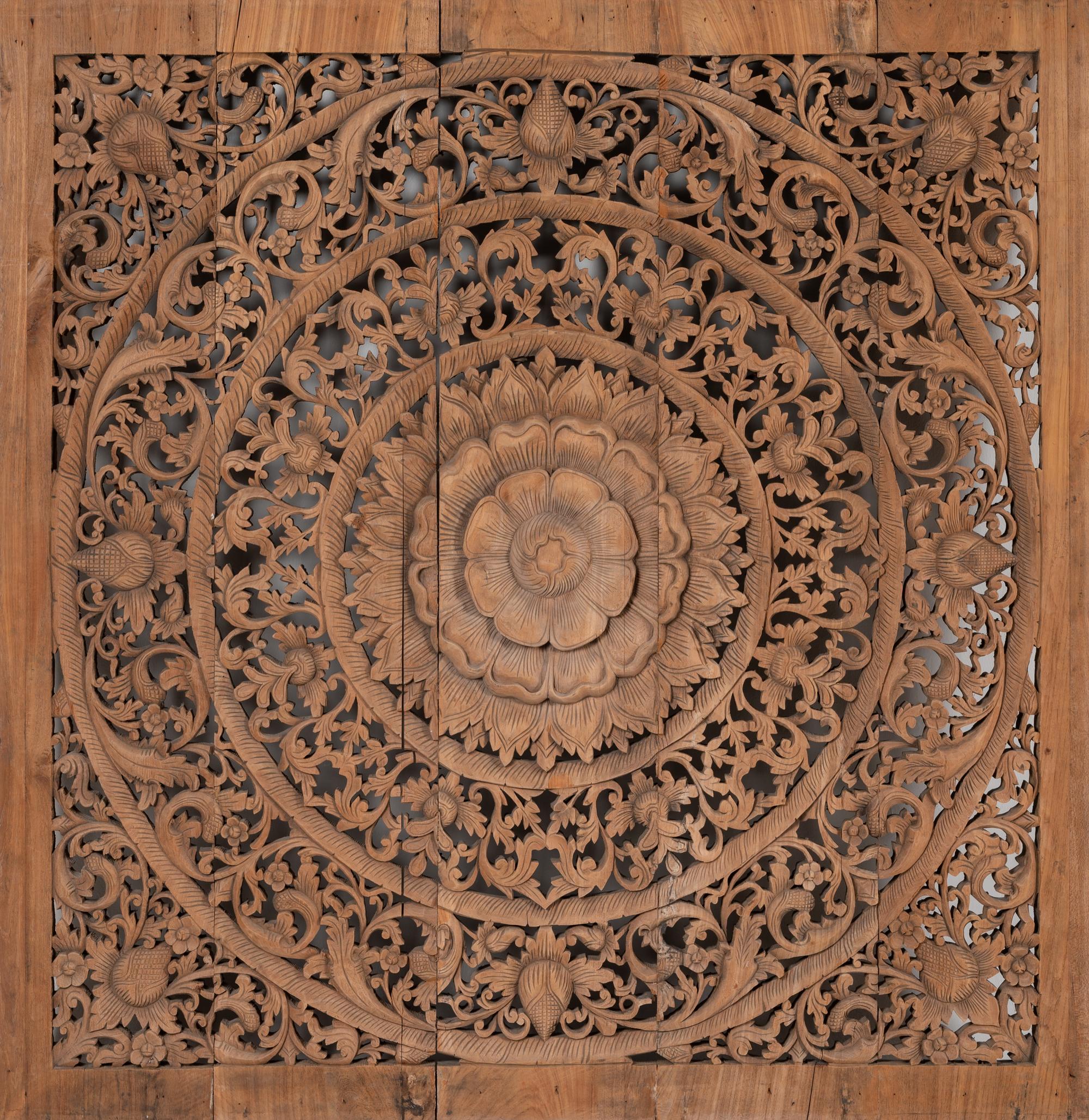 A Southeast Asian Carved Teakwood Mandala Panel