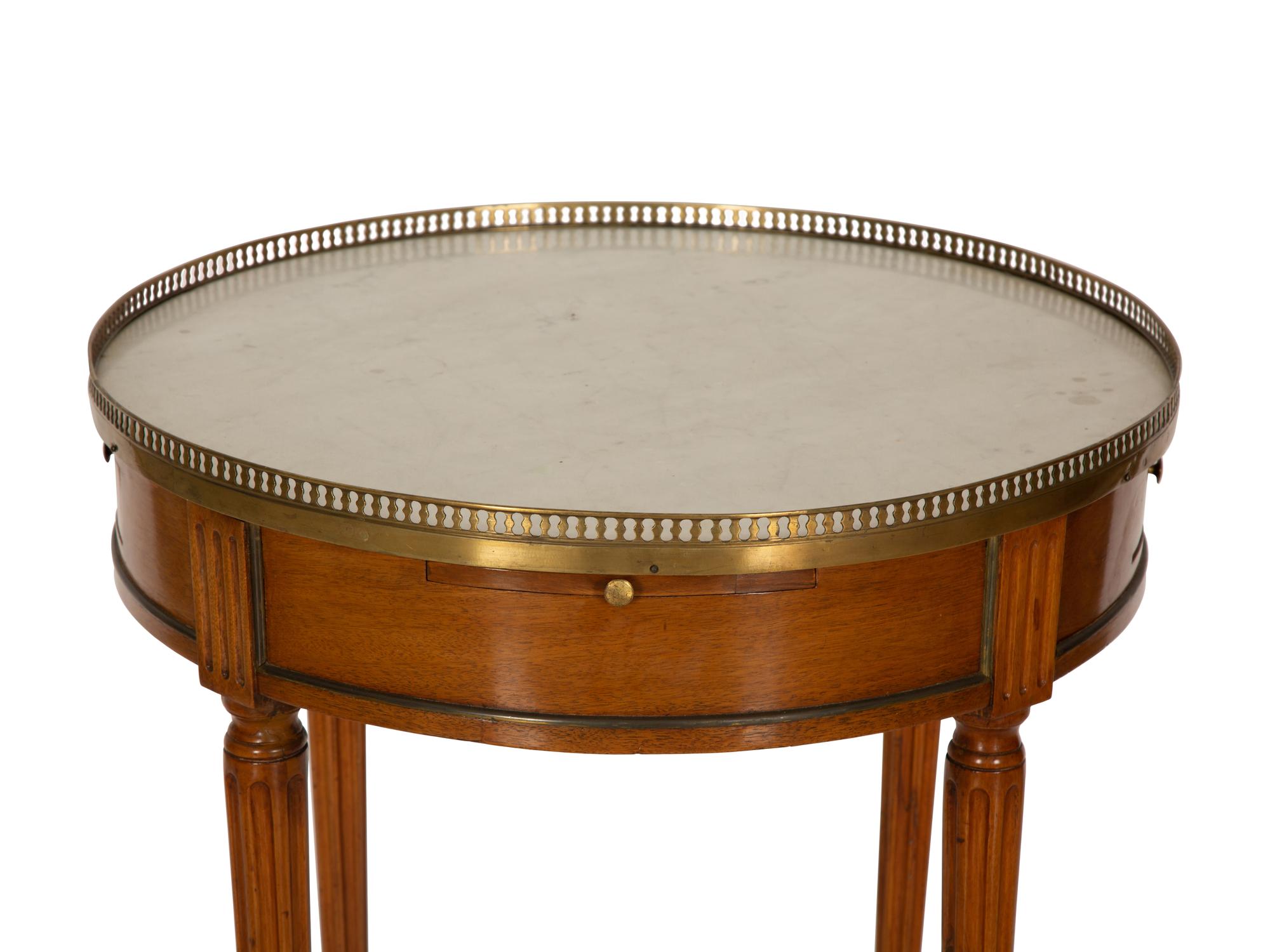 A Louis XVI Style Mahogany Marble-Top Bouillotte Table