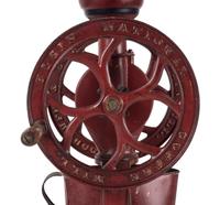 An Elgin National Painted Cast Iron Coffee Mill with Eagle Finial