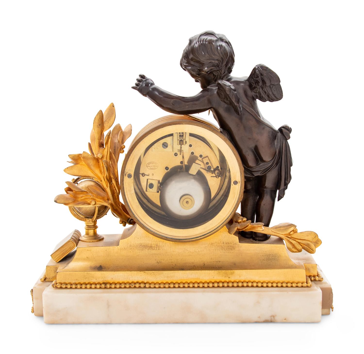 A Louis XVI Style Gilt and Patinated Bronze and Marble Mantel Clock