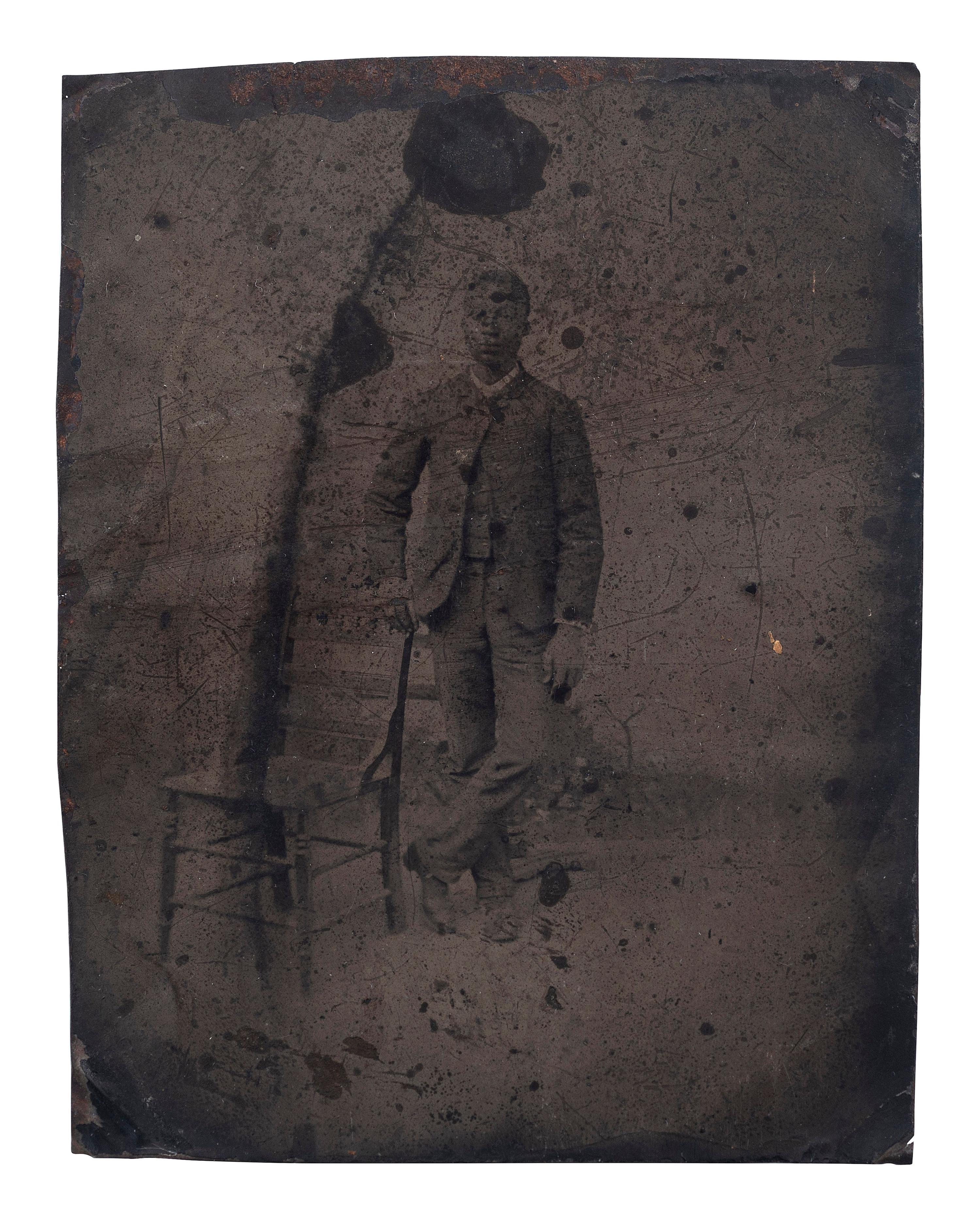[AFRICAN AMERICANA] -- [EARLY PHOTOGRAPHY]. A group of 3 photographs of African American subjects, incl. tintypes and brooch.