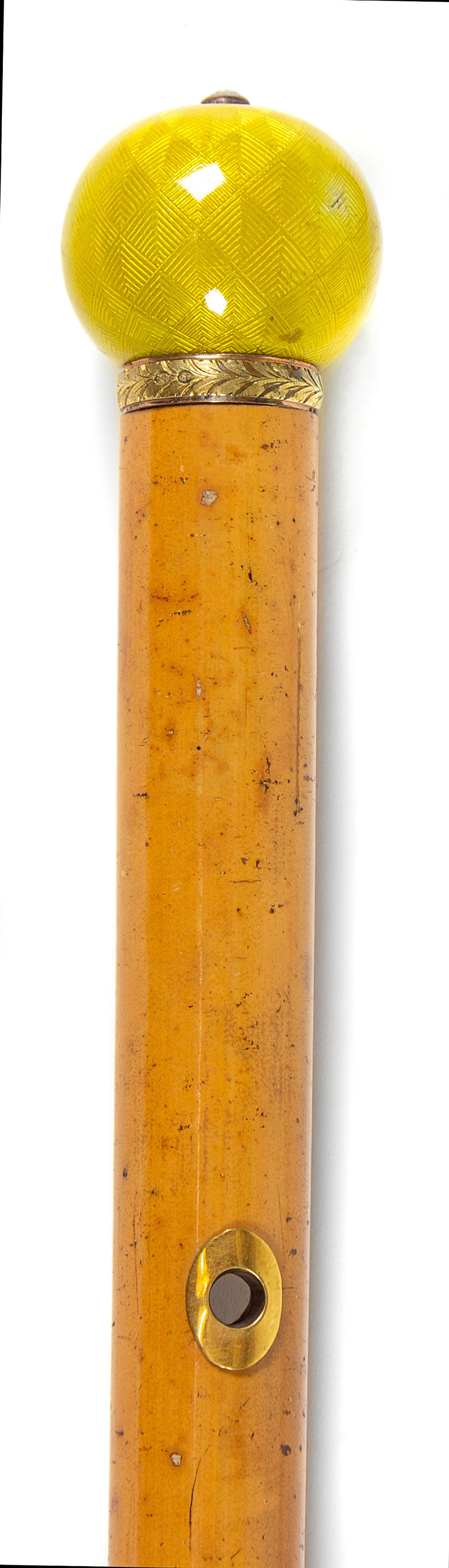 A Russian Diamond-Inset and Guilloche Enamel Mounted Walking Stick Length 33 5/8 inches. — WITH SPURIOUS FABERGE MARKS, 20TH CENTURY