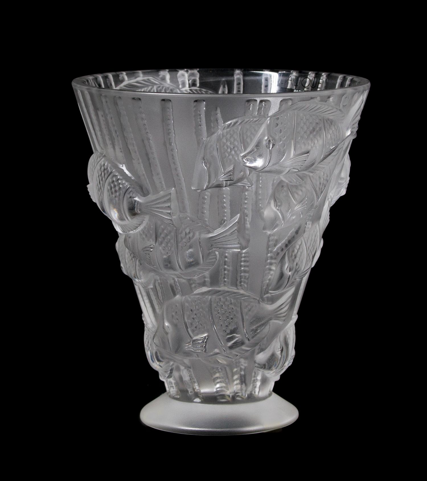 A Lalique Molded and Frosted Glass Vase, Height 6 3/4 inches.