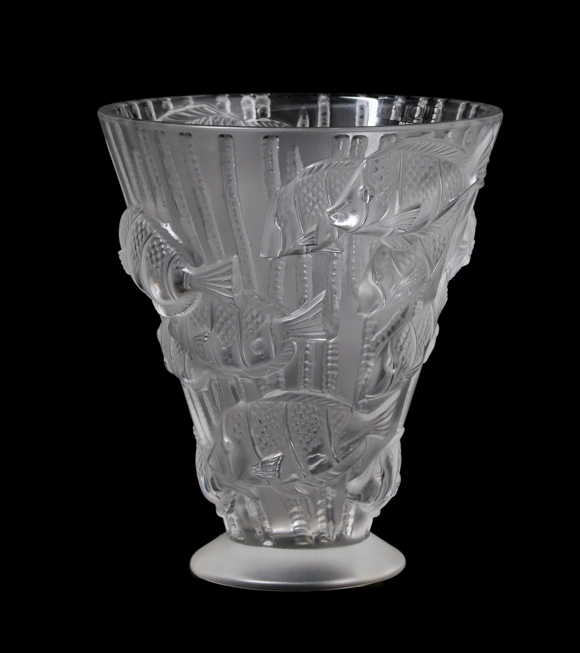 A Lalique Molded and Frosted Glass Vase, Height 6 3/4 inches.