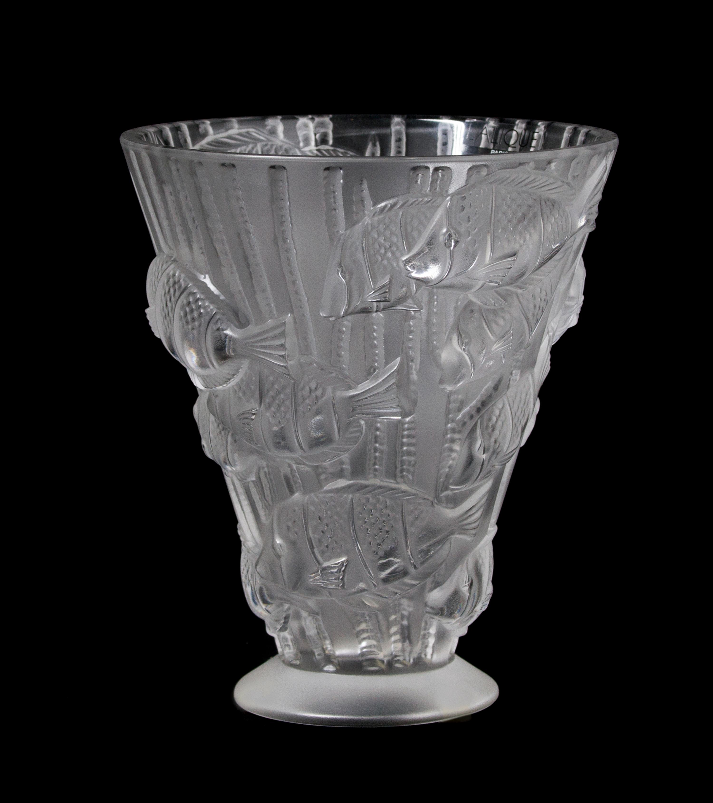 A Lalique Molded and Frosted Glass Vase, Height 6 3/4 inches.