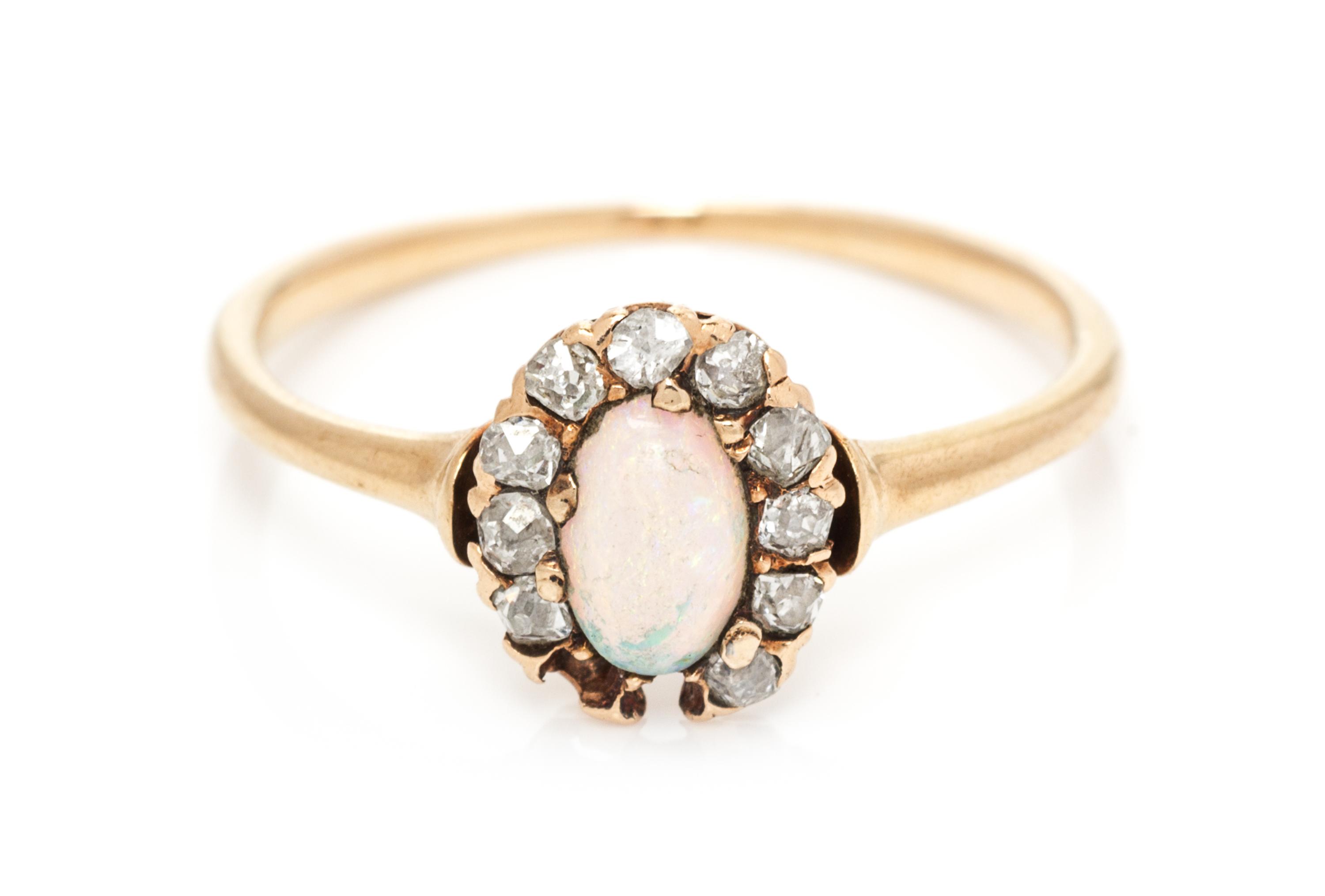 An Victorian Rose Gold, Opal and Diamond Ring, 0.90 dwts.