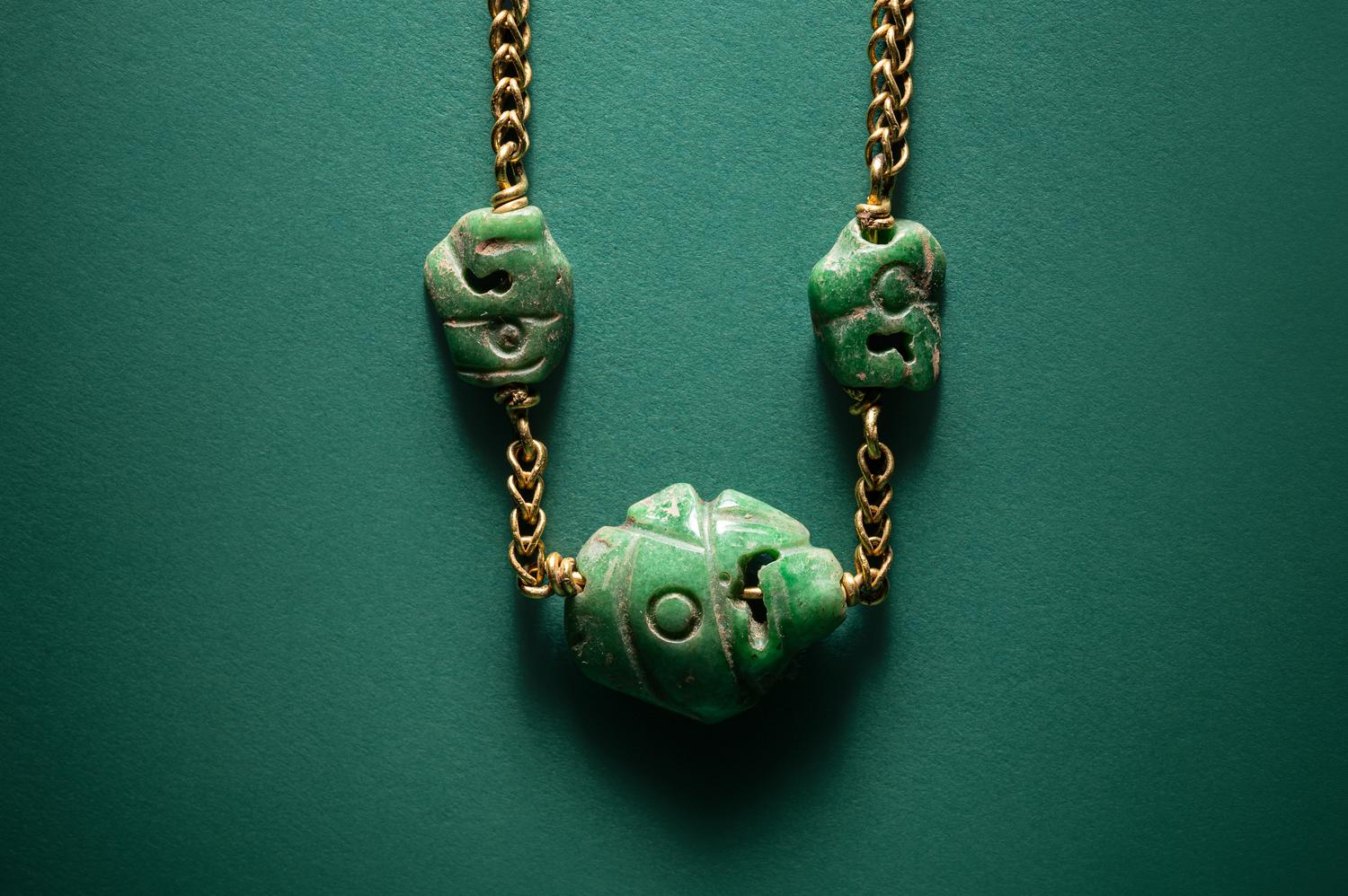Three Maya Jade Parrot Pendants — Strung on a gold necklace