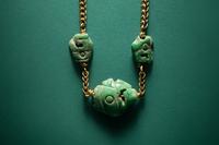 Three Maya Jade Parrot Pendants — Strung on a gold necklace