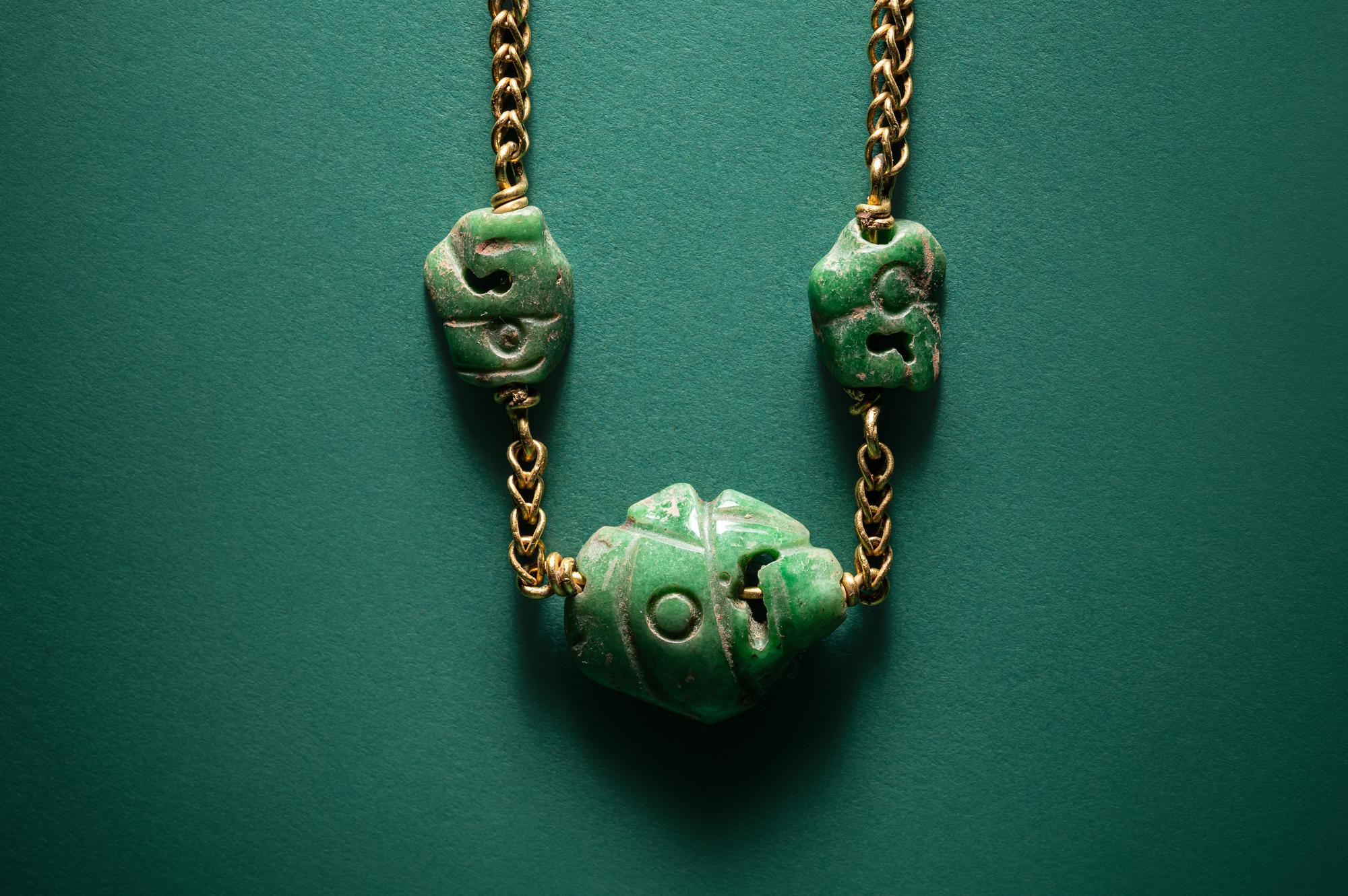 Three Maya Jade Parrot Pendants — Strung on a gold necklace
