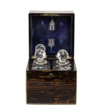 A Regency Calamander Cased Liquor Set, Height 10 1/4 x width 9 x depth 9 inches.