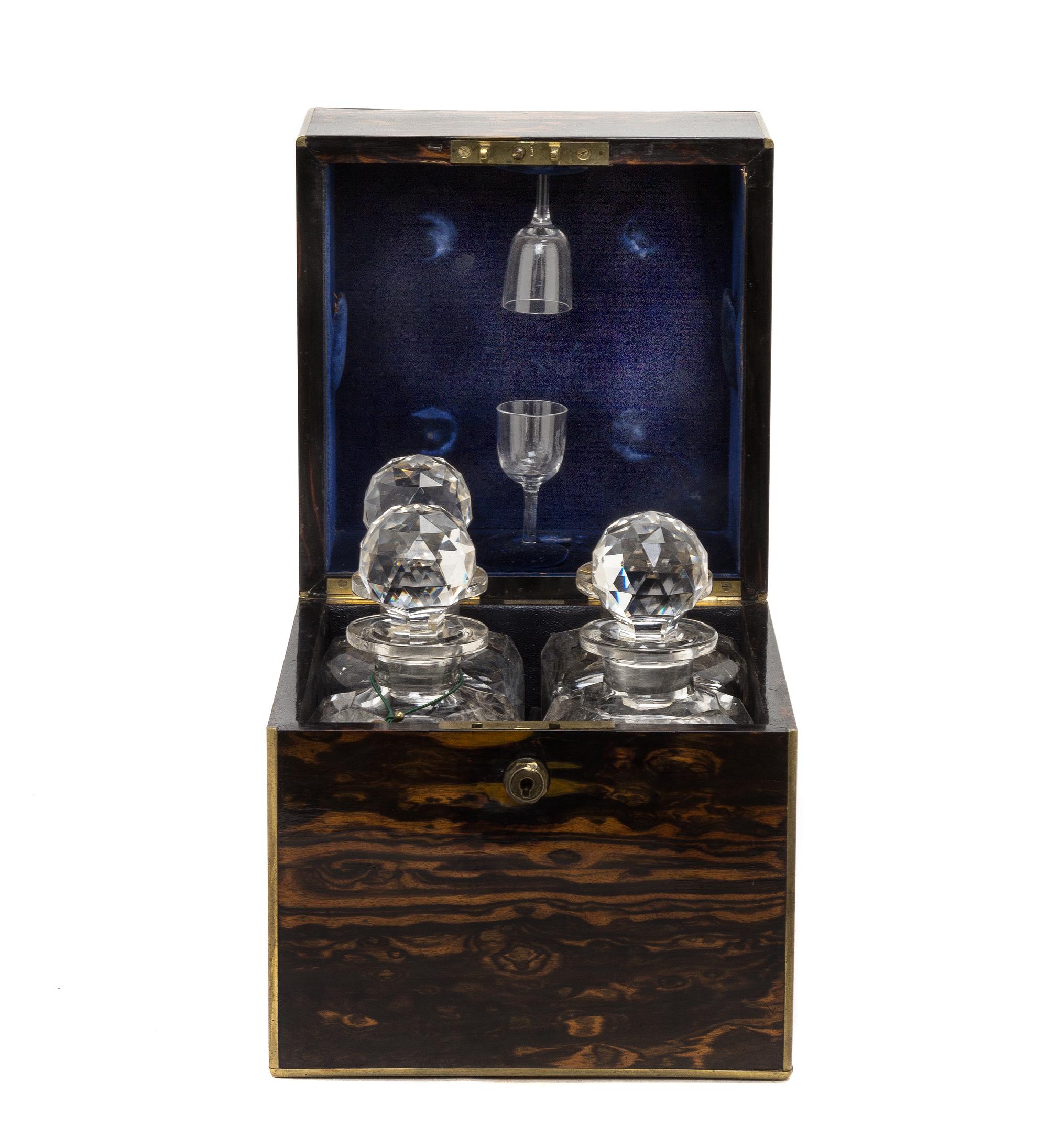 A Regency Calamander Cased Liquor Set, Height 10 1/4 x width 9 x depth 9 inches.