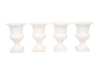 A Set of Four White Glazed Faience Urns