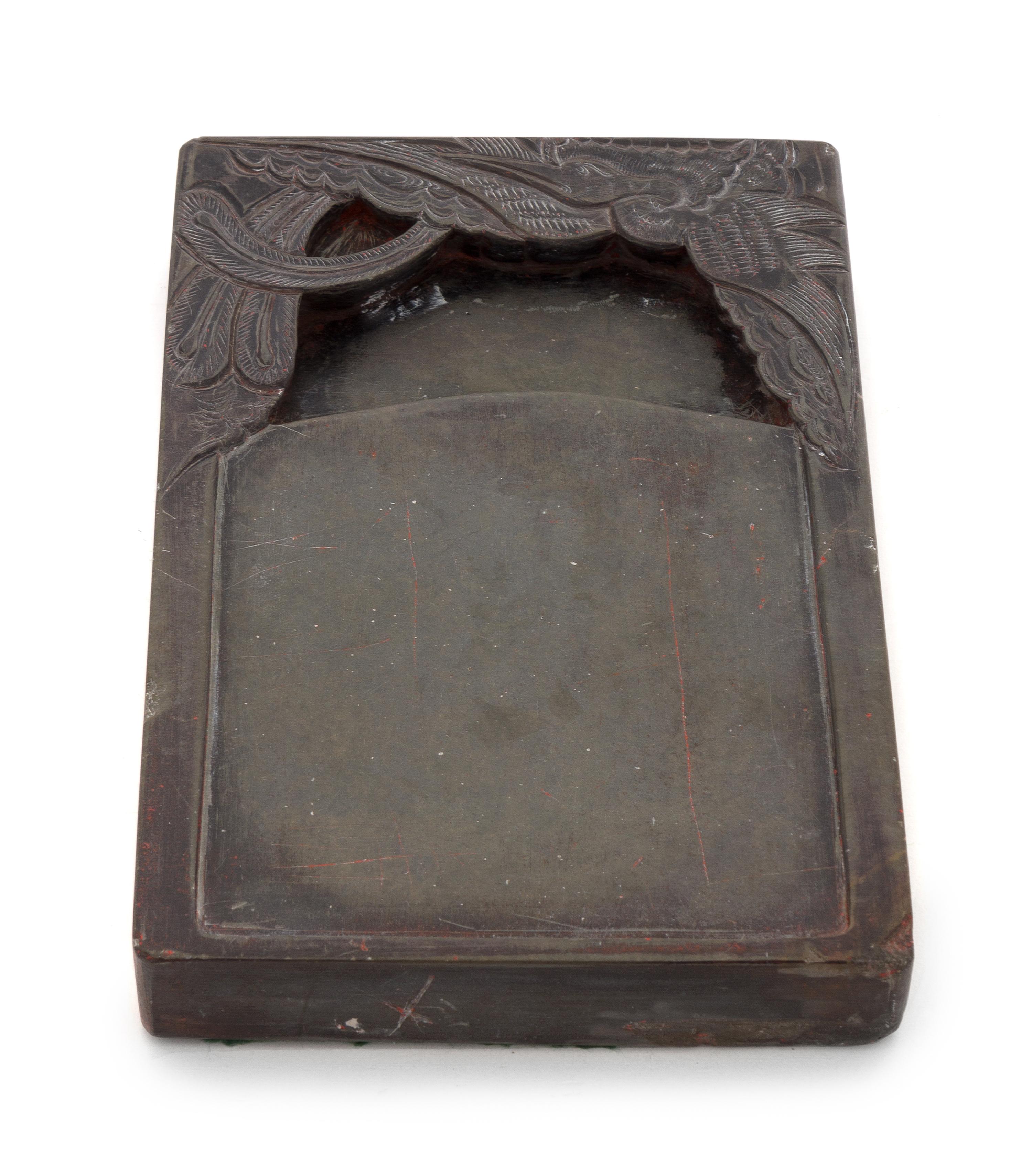 A Duan Inkstone Height 8 1/4 x width 5 1/2 x depth 1 1/4 inches.