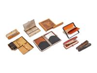 A Group of Eight Cigarette Cases and Holders