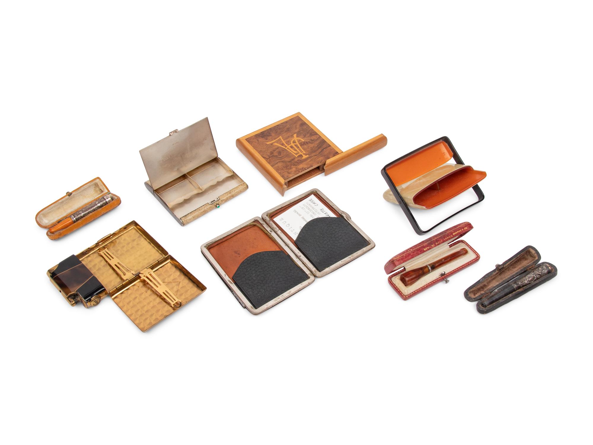 A Group of Eight Cigarette Cases and Holders