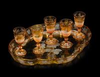 A Collection of Bohemian Amber Cut to Clear Glassware