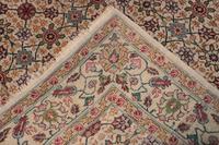 A Tabriz Wool Rug