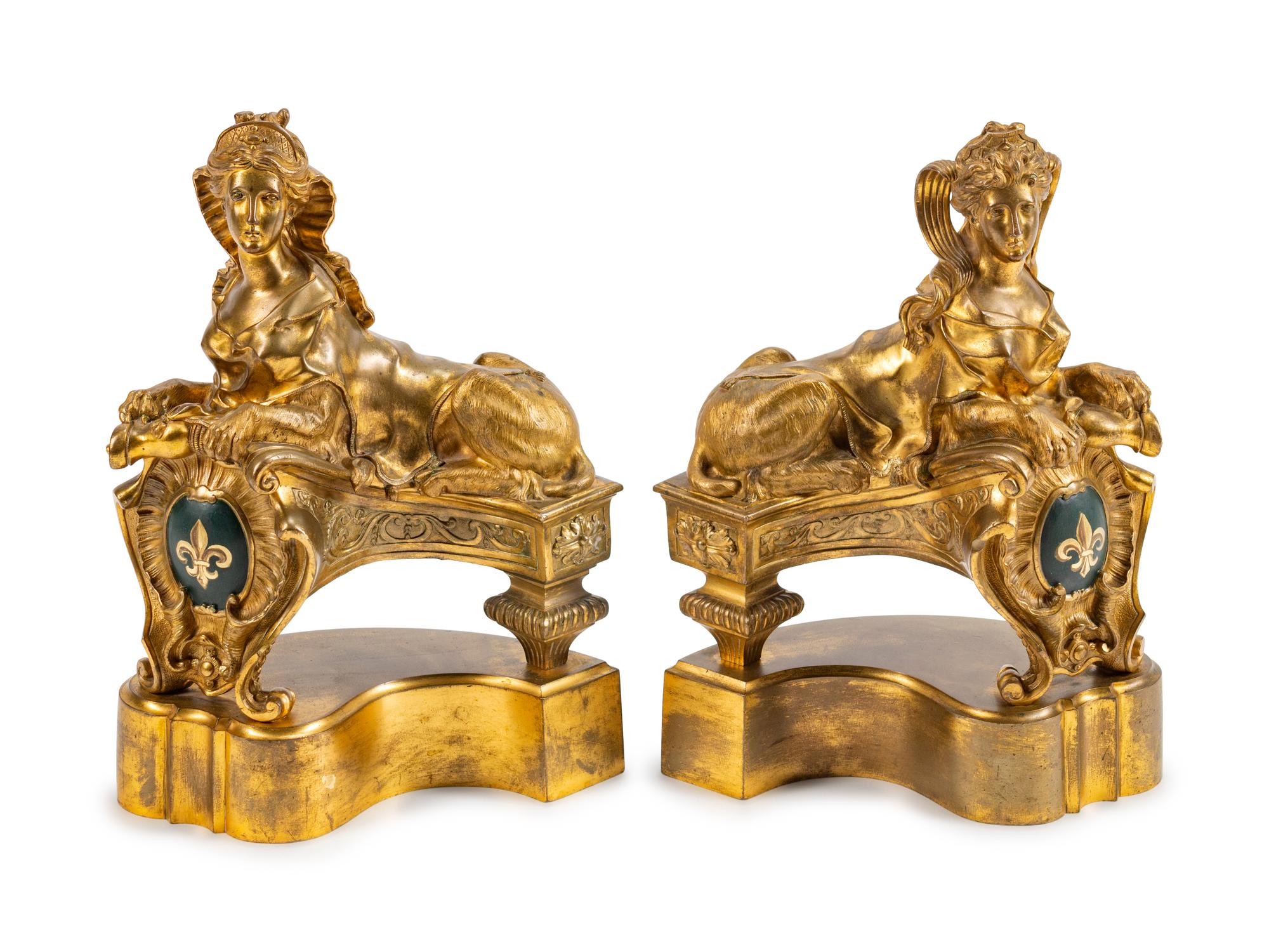 A Pair of Régence Style Gilt-Bronze Sphinx-Form Chenets — 19TH CENTURY