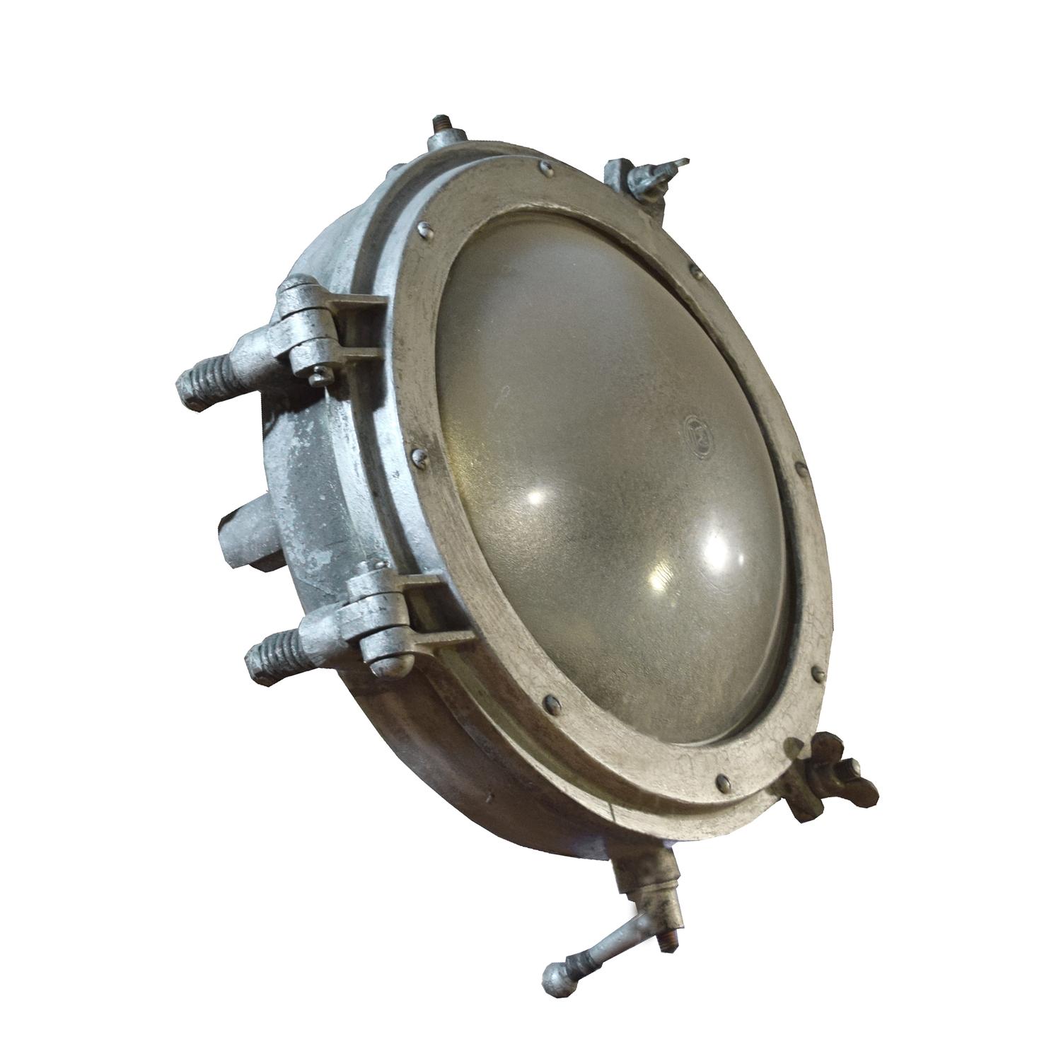 An Industrial Glass and Metal Light Fixture 20" W x 12" D x 20" H — United States, Circa 1950