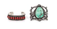 Two Southwestern Style Silver Bracelets Length of the first 5 1/4 x opening 1 1/8 x width 2 1/4 inches.