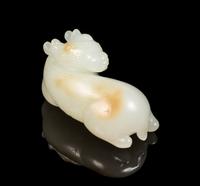 A White Jade Figure of a Deer Length 2 1/4 inches. — 18TH/19TH CENTURY