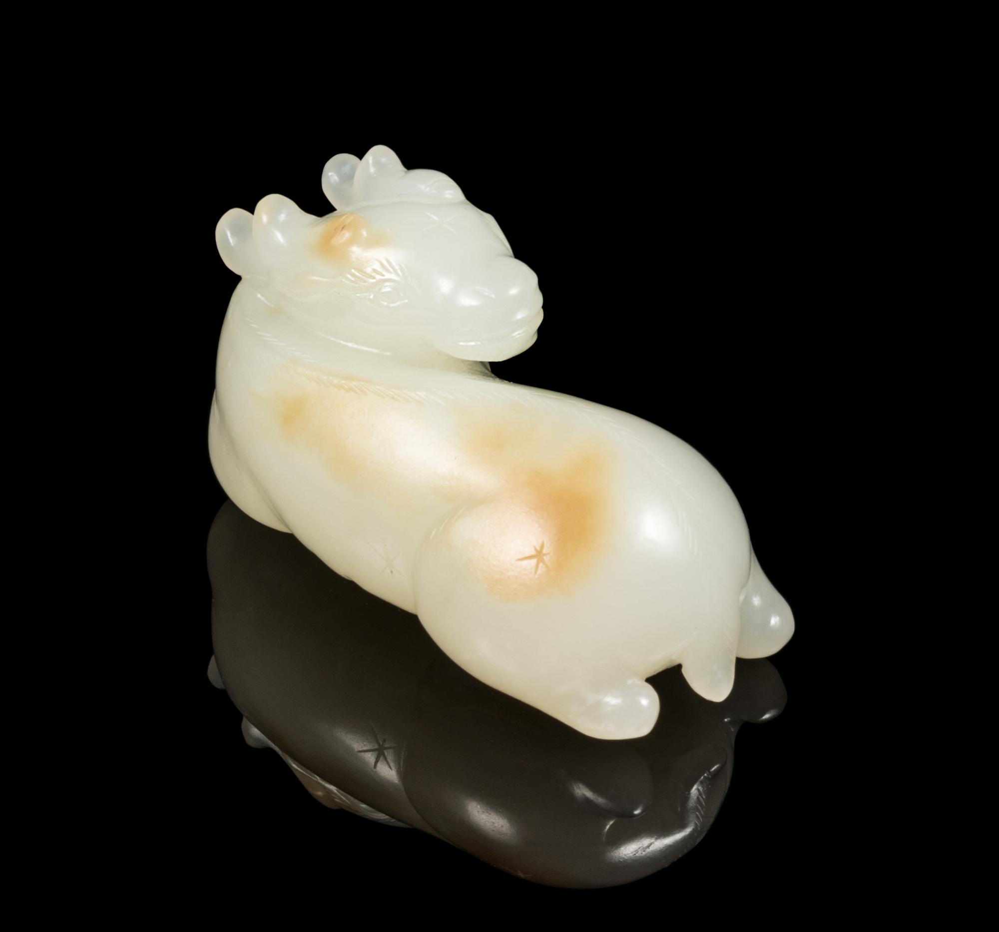 A White Jade Figure of a Deer Length 2 1/4 inches. — 18TH/19TH CENTURY