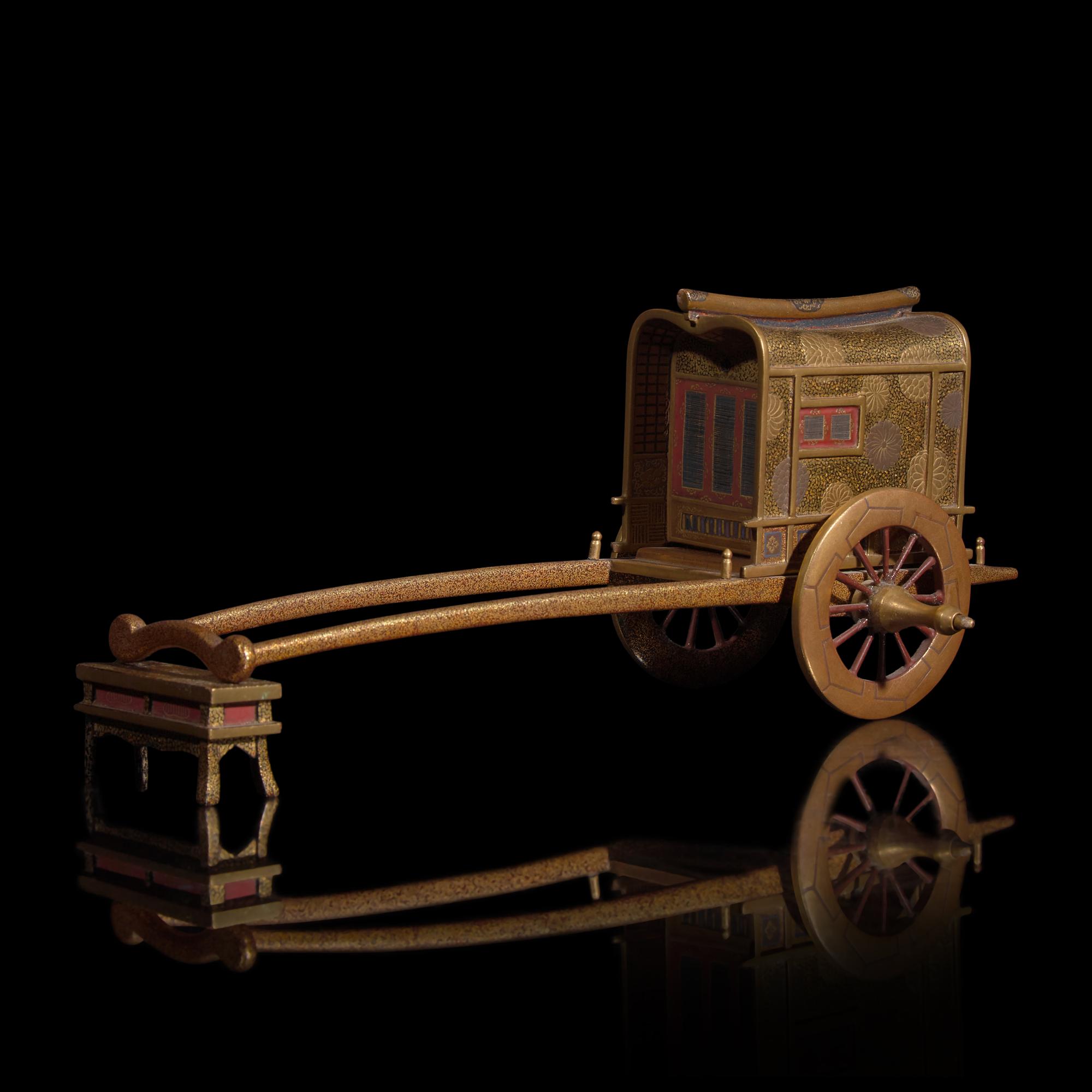 A Japanese Gilt Lacquer Carriage-Form Koro with Stand, Meiji Period