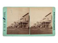 [WESTERN AMERICANA]. HAYNES, F.J., photographer. Stereview of Main Street, Bismarck, Dakota Territory.