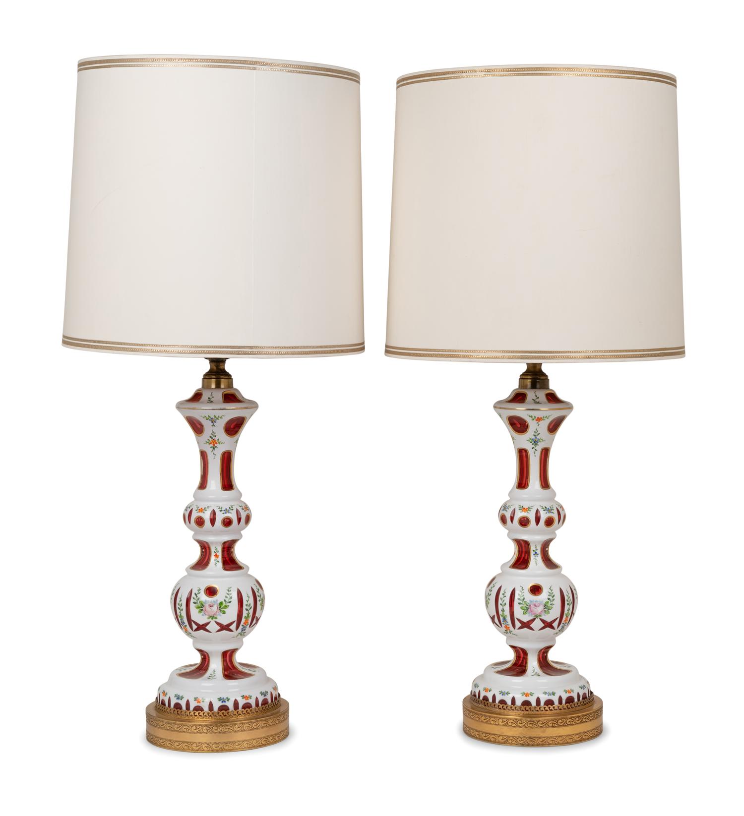 A Pair of Bohemian Enameled White Overlay Ruby Glass Lamps