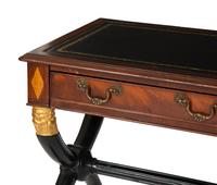 A Regency Style Parcel Gilt and Ebonized Mahogany Leather Top Console Table