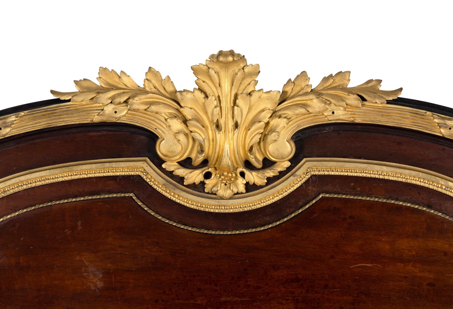 A Louis XVI Style Gilt Bronze Mounted Mahogany Headboard