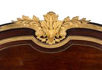A Louis XVI Style Gilt Bronze Mounted Mahogany Headboard