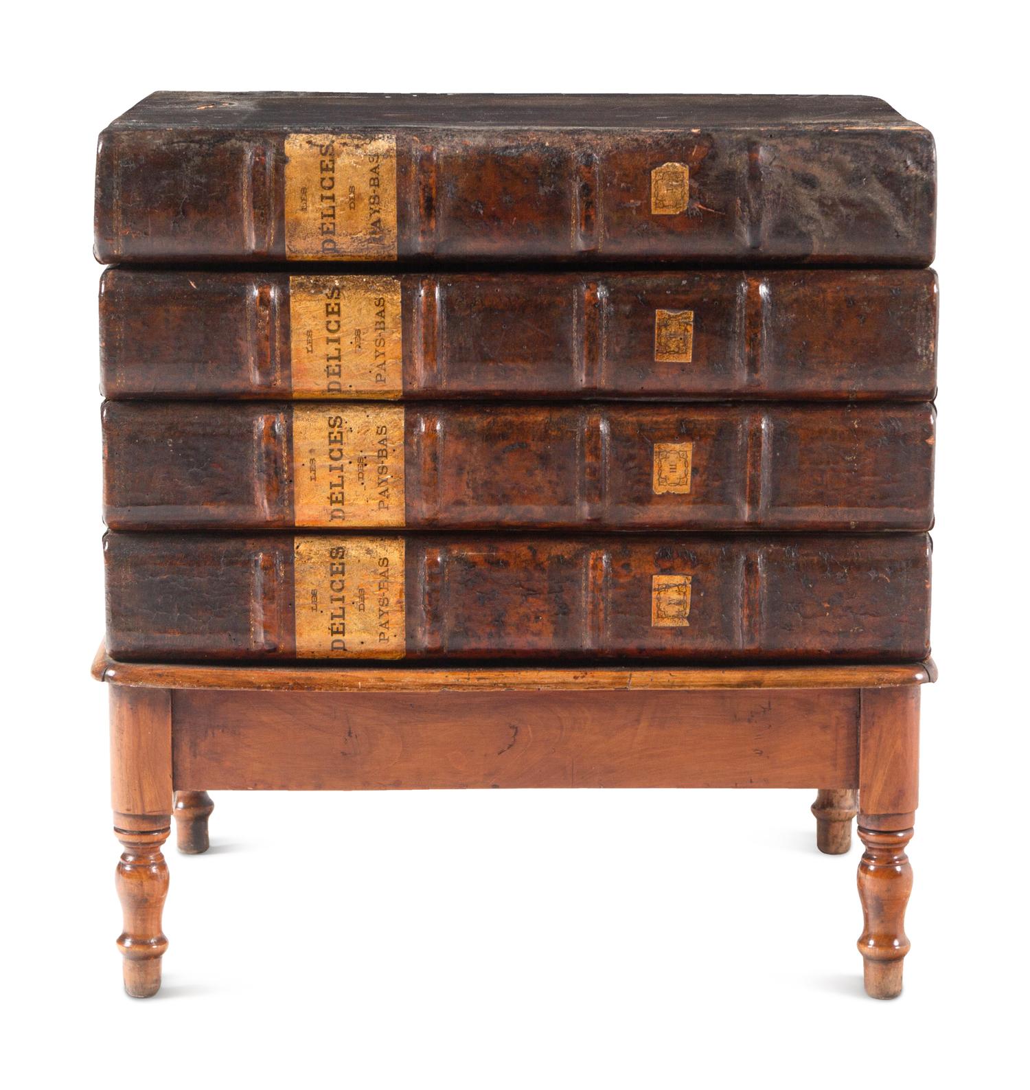 A Louis Philippe Book Spine and Birch Low Storage Table