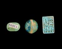 Two Egyptian Faience Seals and an Inscribed Bead