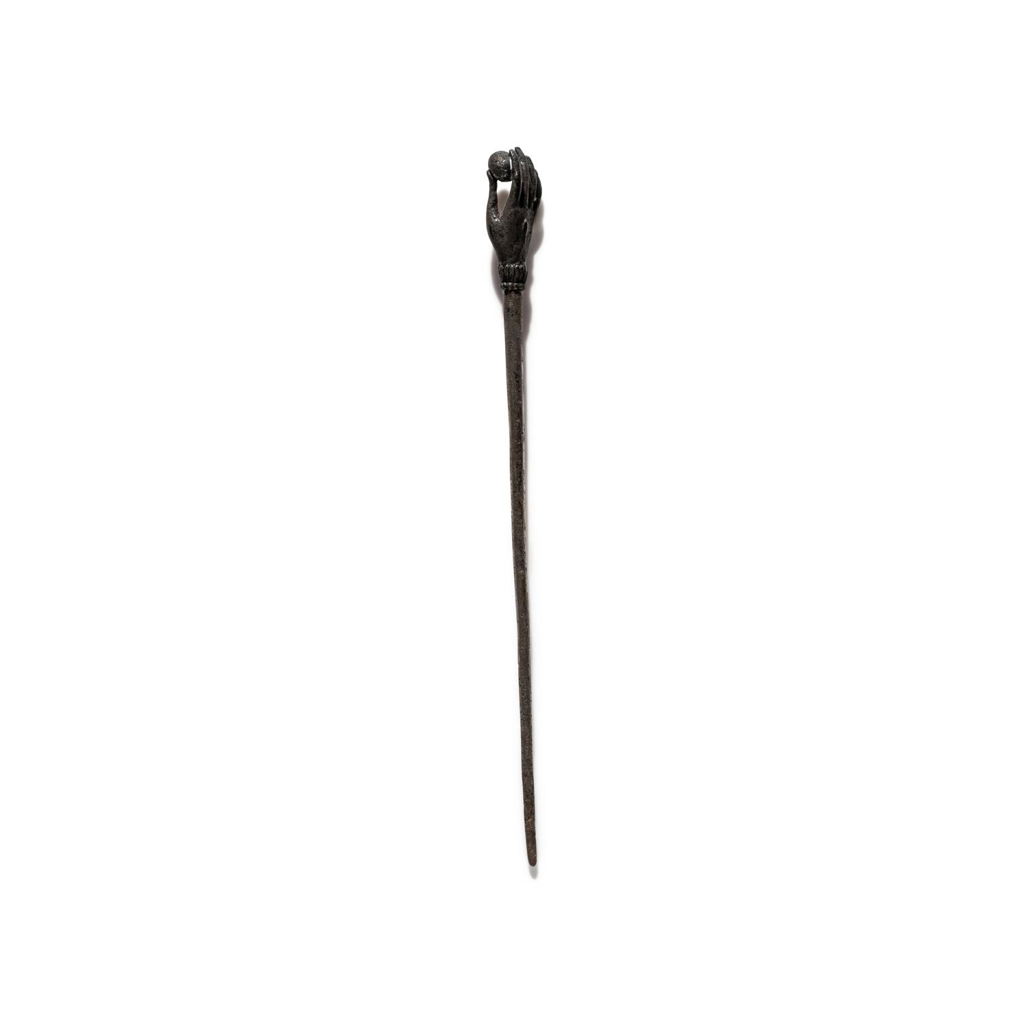 A Roman Silver Stickpin with a Hand and Pomegranate Finial