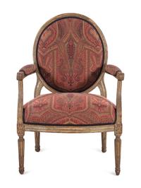 A Louis XVI Painted Fauteuil with English Upholstery