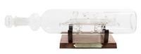 A Spanish Blown Glass Model of a Locomotive in a Bottle Width 11 3/4 inches. — CIRCA 1920s