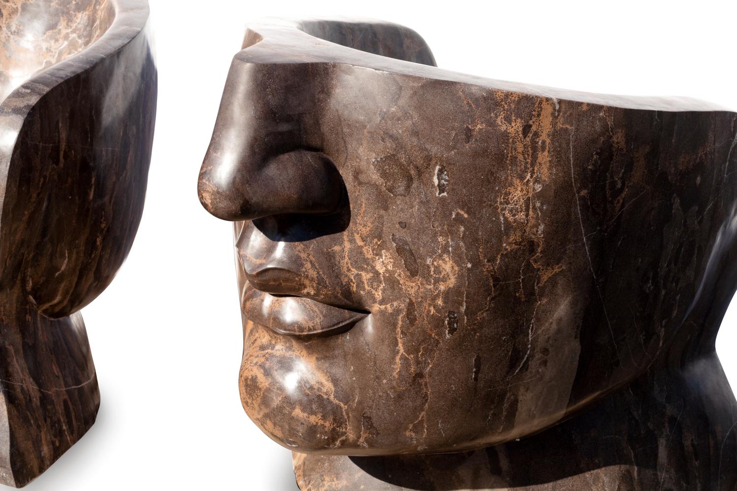 A Pair of Italian Carved Marble "Face" Chairs