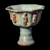 A Chinese Longquan Celadon Glazed Porcelain 'Eight Immortals' Stem Cup